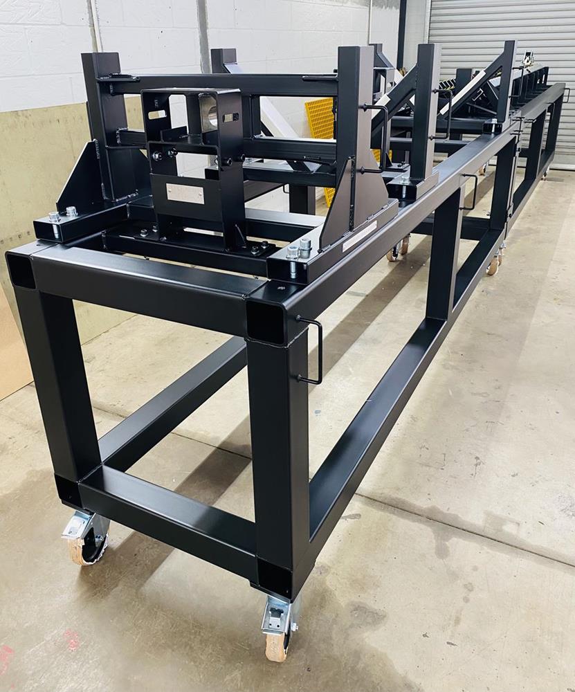 A black metal powder coated railing